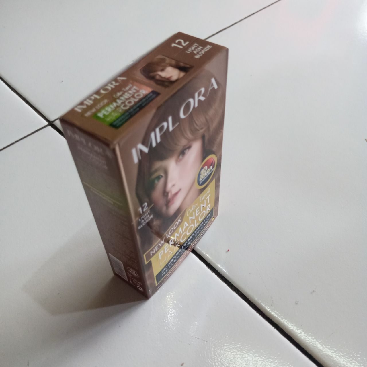 ini adalah Implora Hair Color 12 Light Ash Blonde, brand: Implora, age_group: all ages, gender: unisex